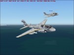 2 EA-6 Prowlers in a turn.JPG